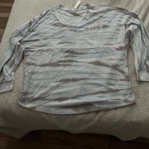 pink vs large blue white and gray terry pullover